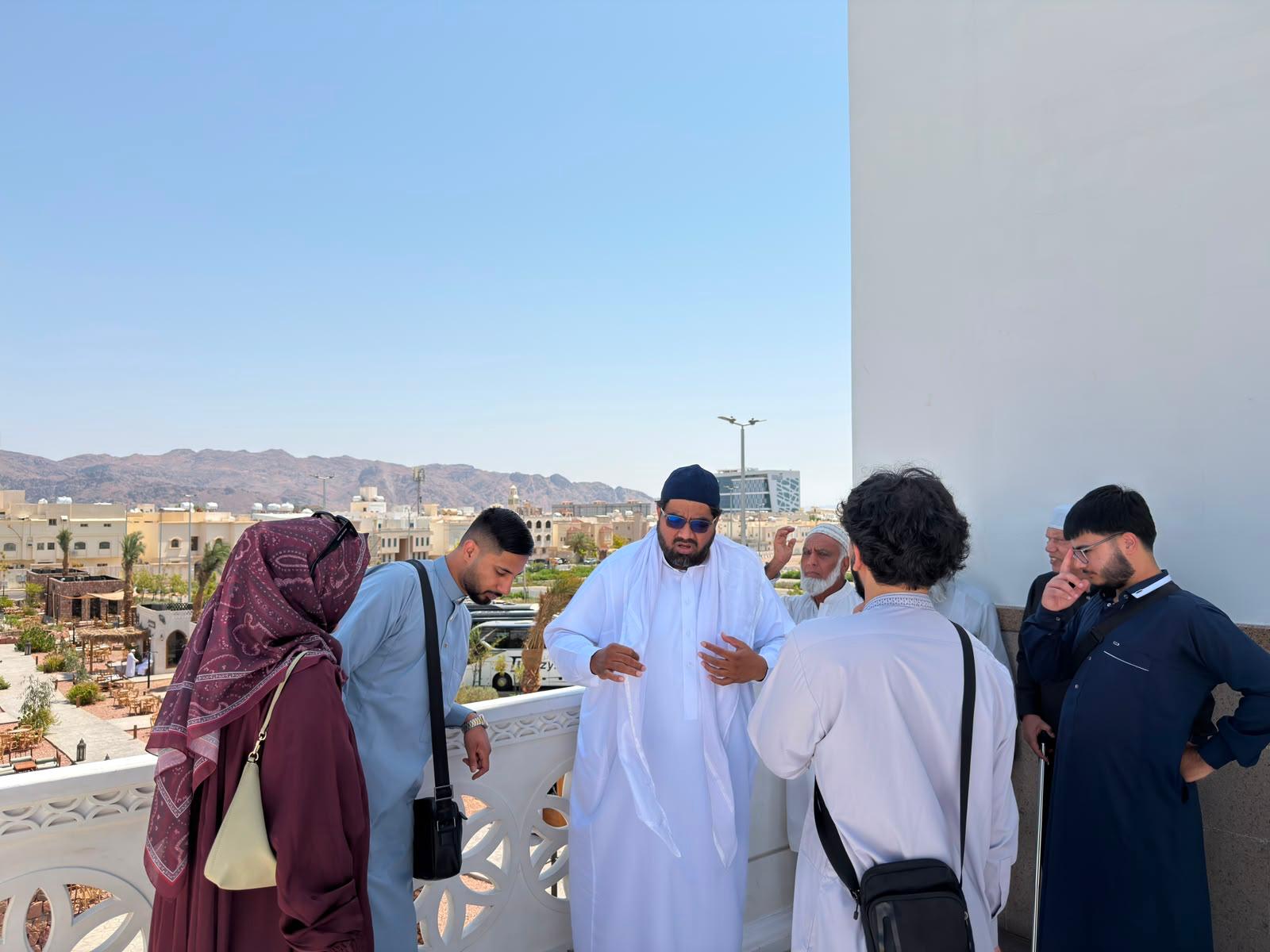 Scholar guiding HR Travels pilgrims